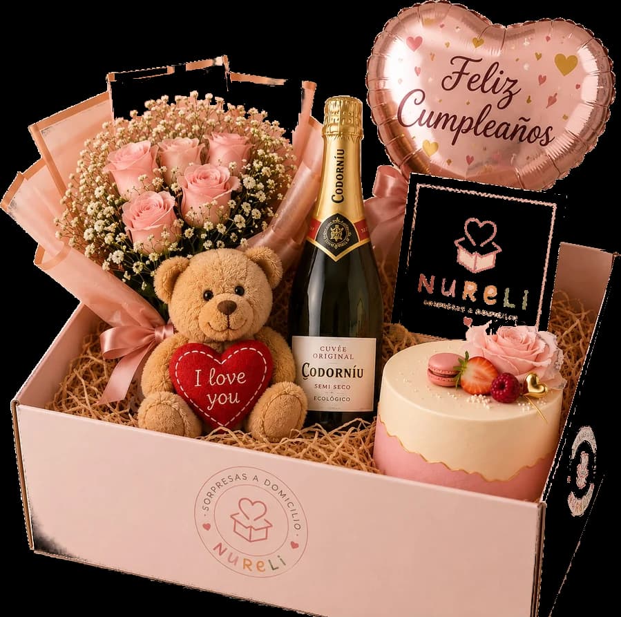 Nureli box with a bouquet of roses, a teddy bear holding a heart, a bottle of sparkling wine, a cake and a happy birthday balloon